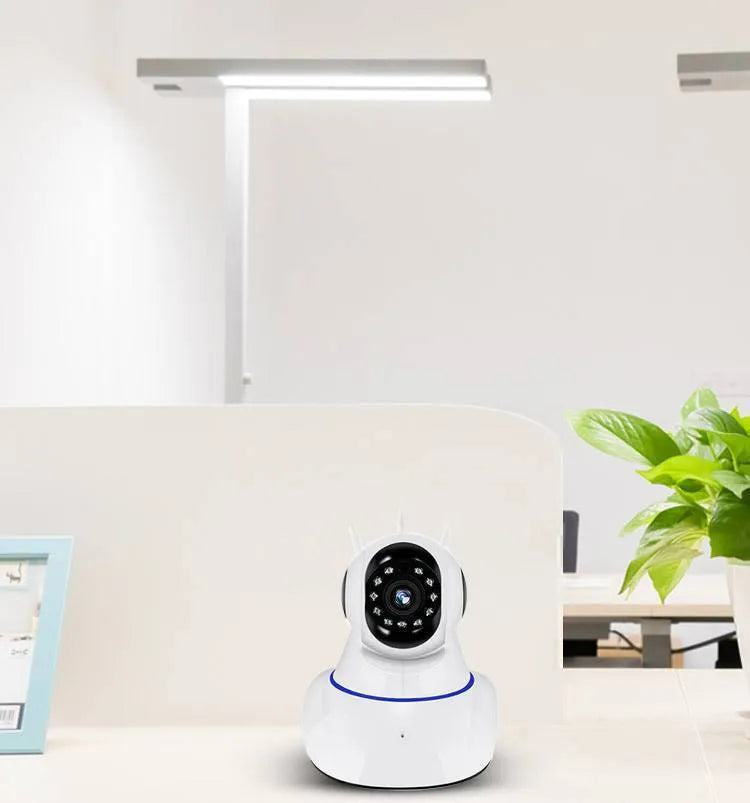 White wireless dome security camera on a stand with a 3.6mm lens.