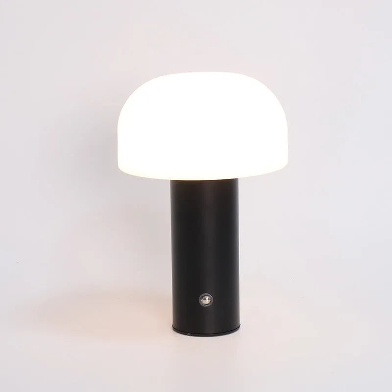 USB-powered decorative atmosphere table lamp in black, green, orange, or white plastic.
