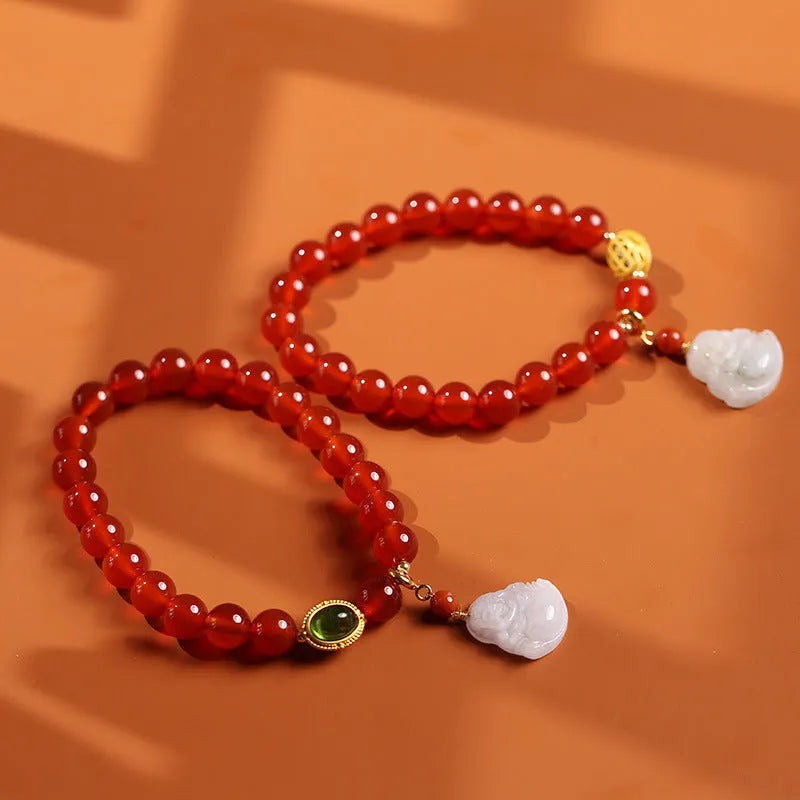 Red agate bracelet with amber geometric component and Maitreya Buddha pendant featuring ancient gold hanging jade accents