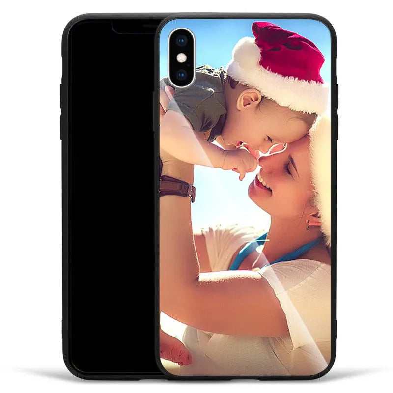 Patterned ultra-thin iPhone case with raised camera bumper edge on a table.