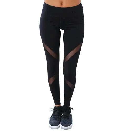 Women's yoga pants with butterfly mesh gauze panels in black, dry fit nylon spandex fabric