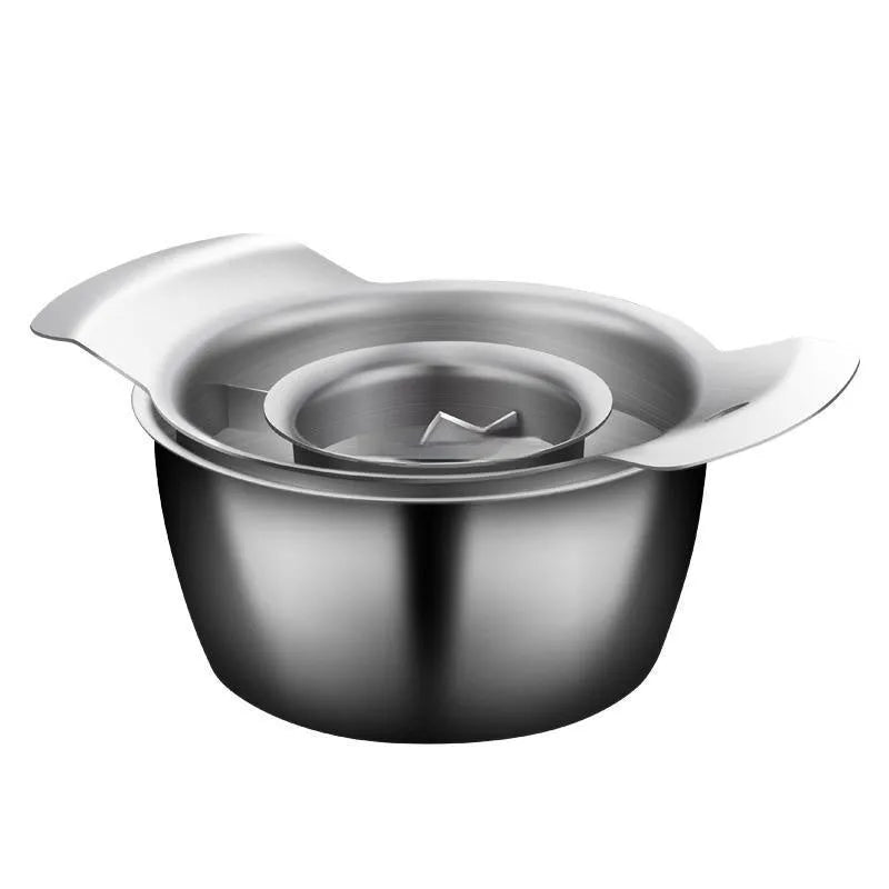 Stainless steel pomegranate fruit cutter tool with optional bowl and wooden hammer on a kitchen surface.