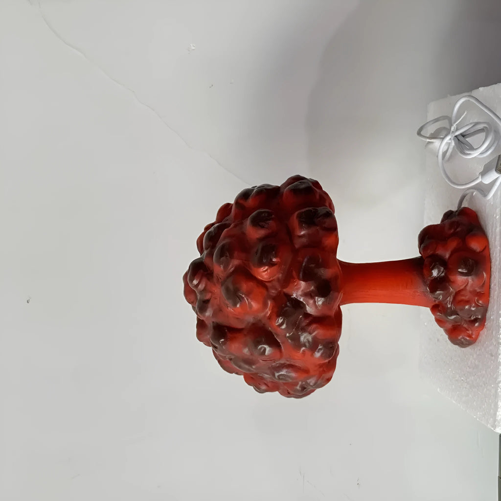 Modern art desk lamp shaped like an atomic bomb mushroom cloud, with a USB power cable.