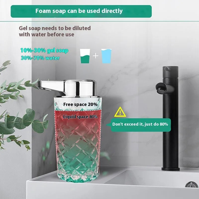 Silver automatic sensor soap dispenser with USB Type-C charging port on countertop.