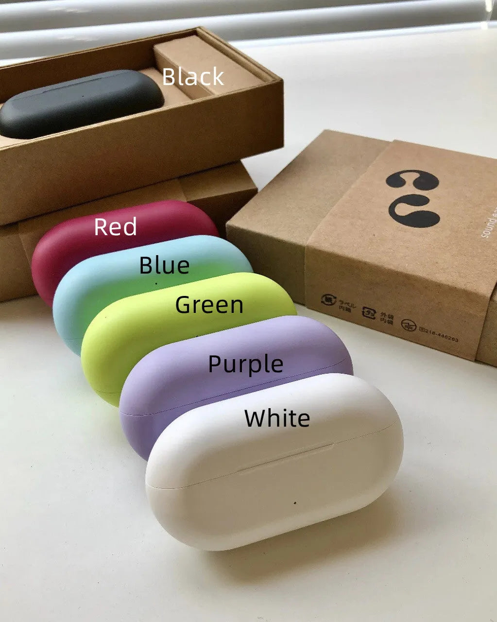 Bone conduction ear clip headset in macaron colours with Qualcomm chip and 20 metre range