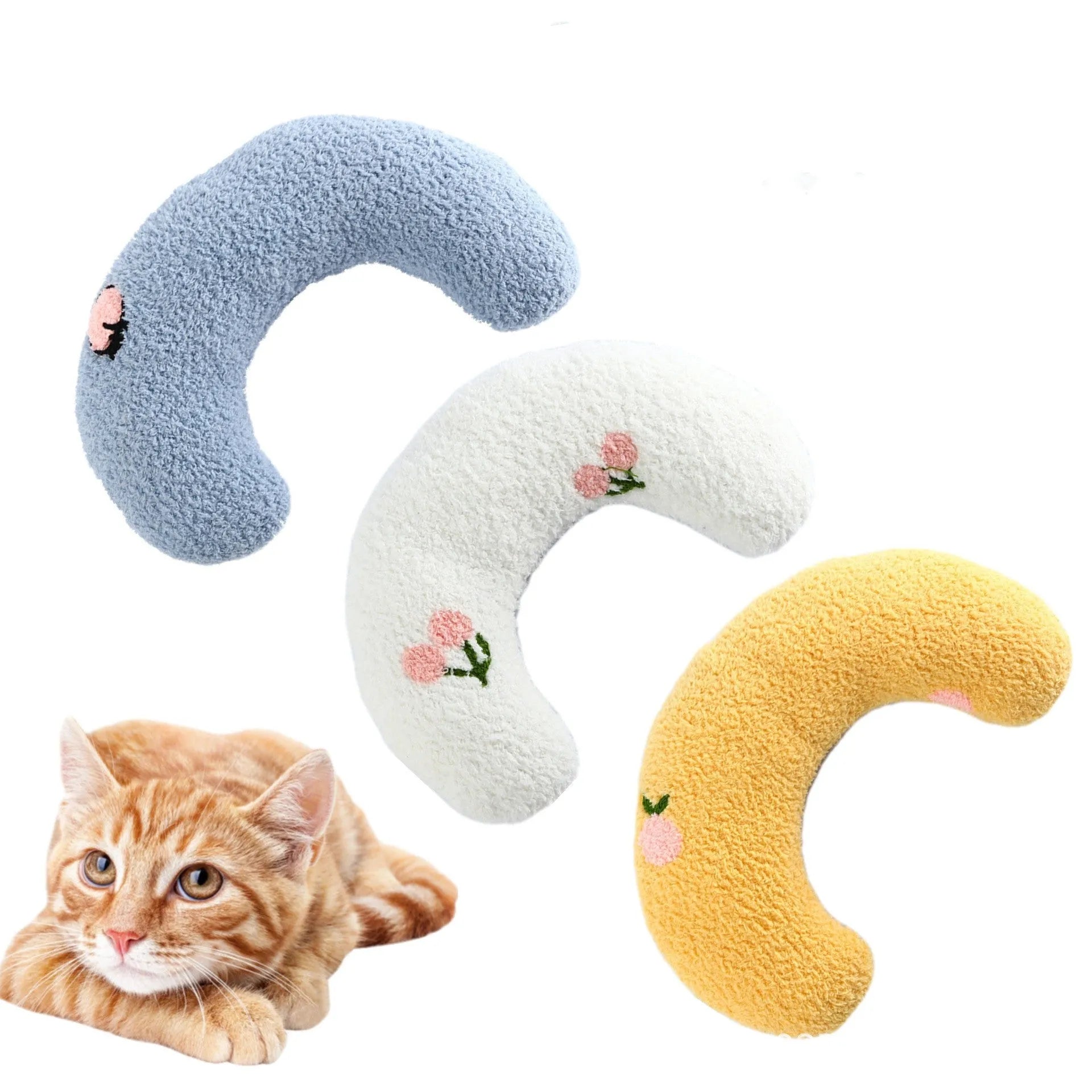 White U-shaped plush pet pillow for a small cat or dog on a grey background.