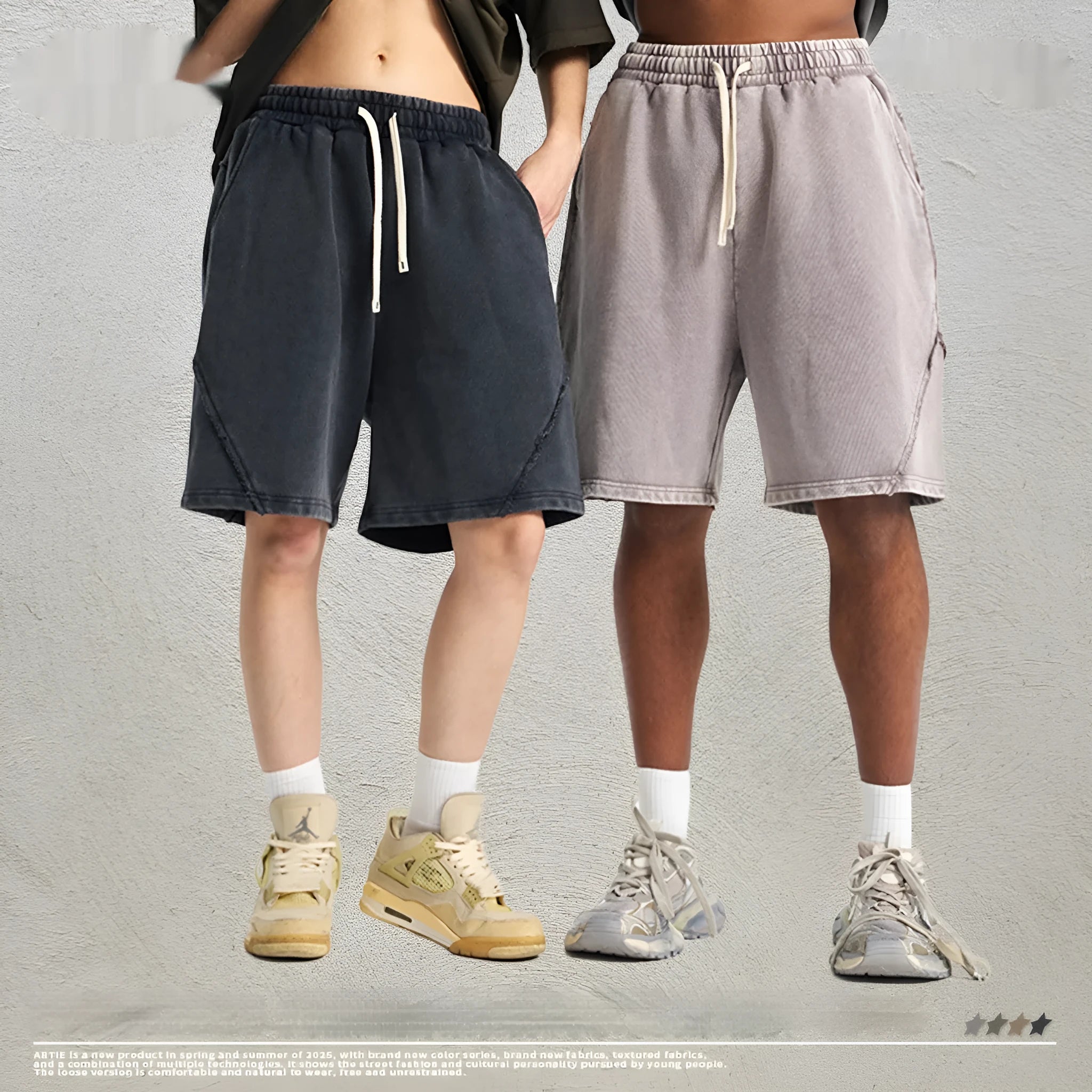Man wearing batik pattern cotton terry shorts in a loose street fashion cut