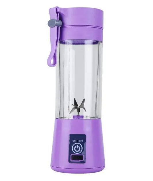 Mini USB-powered centrifugal fruit juicer in pink, with a 400ml plastic cup and stainless steel blade.