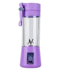 Mini USB-powered centrifugal fruit juicer in pink, with a 400ml plastic cup and stainless steel blade.