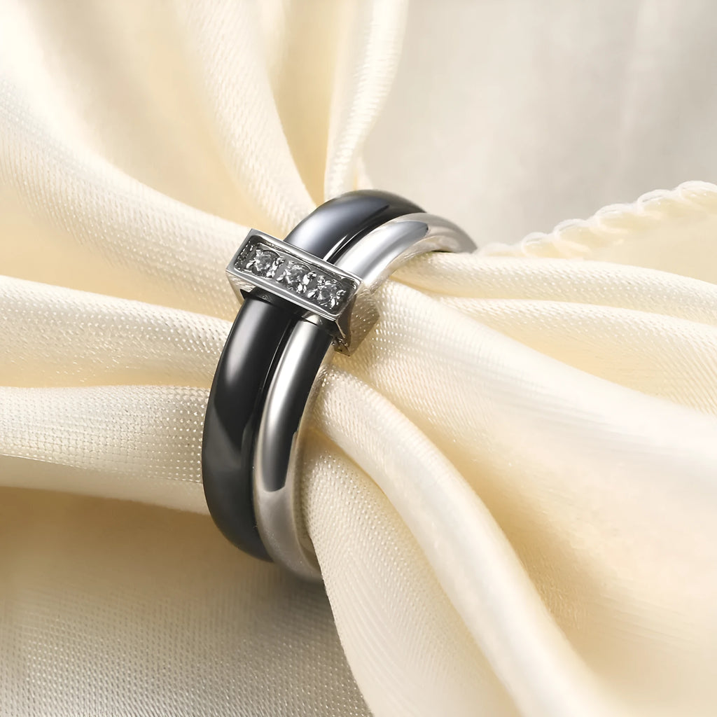 Glossy stitch and zirconium inlay ceramic ring for women in gold white on a geometric band.