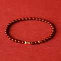 Handmade natural cinnabar koi bracelet with golden ball in national style