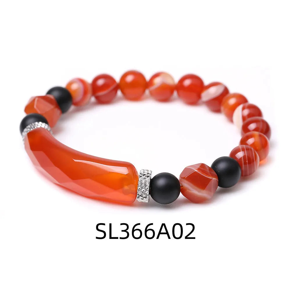 Handmade diamond-shaped cut agate bracelet with geometric pattern and fan-shaped elements