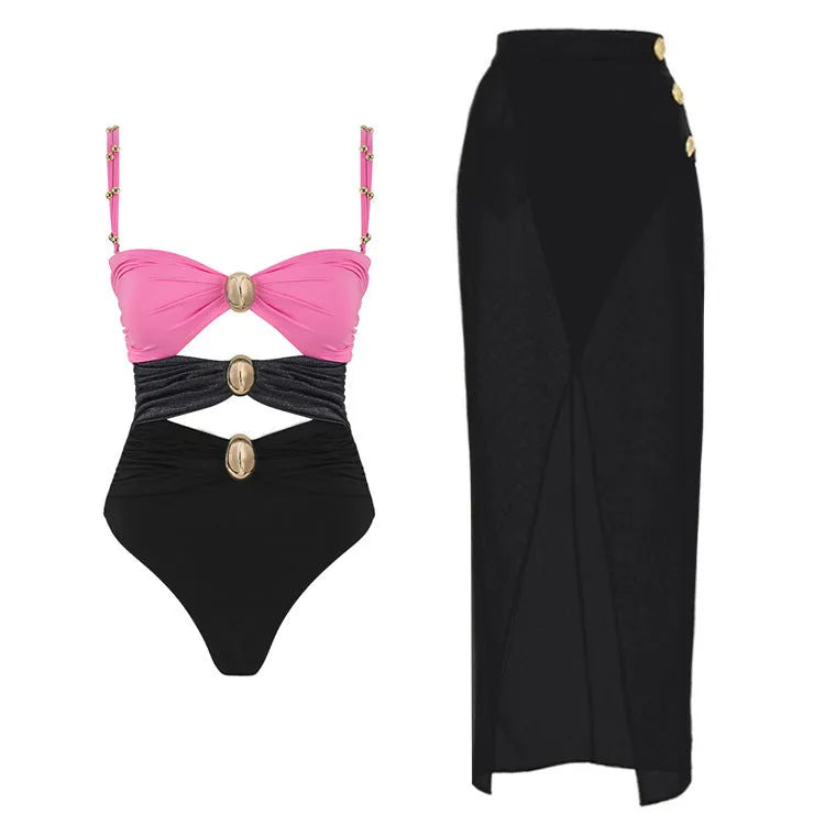 Women's solid colour one-piece swimsuit with gold button and matching skirt in assorted colours.
