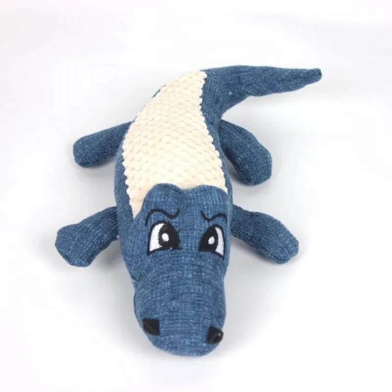 Blue, green, and red pet plush toy with corn grid texture for biting and chewing