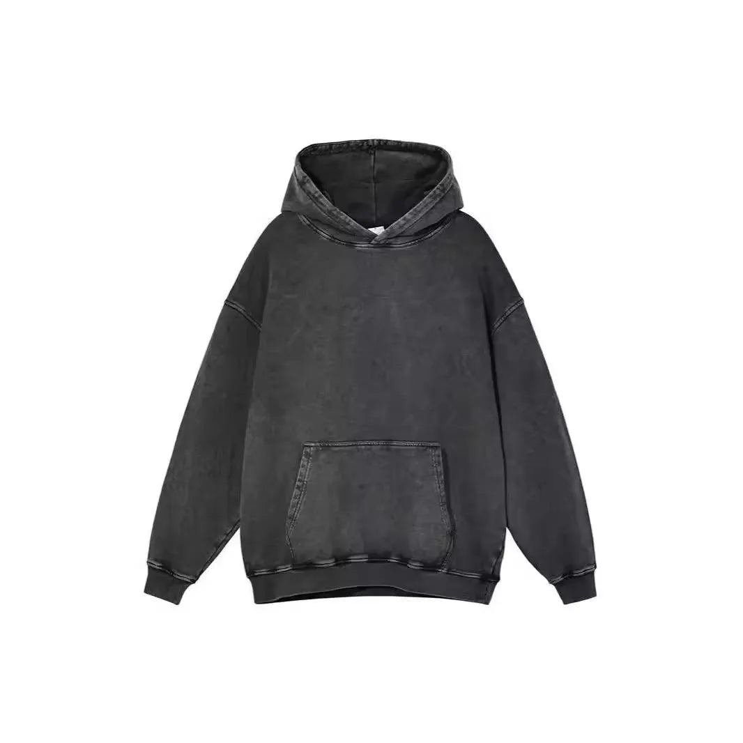 Men's loose-fitting collarless batik sweater in washed cotton, shown in a hooded colour with drop-shoulder sleeves.