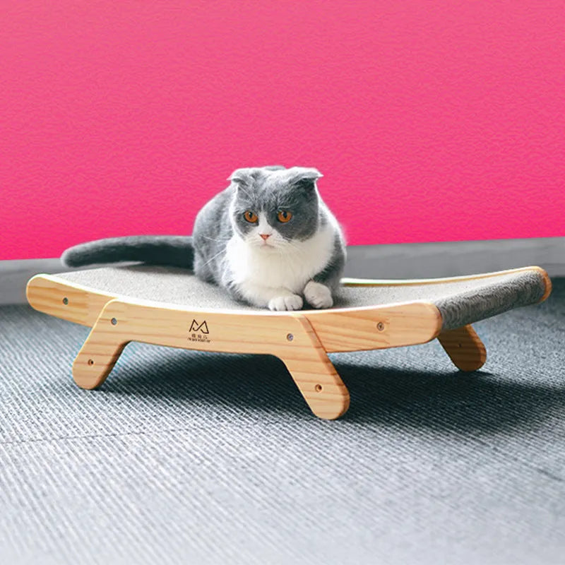 Deformation cat bed and scratcher in primary colour with corrugated paper surface, pine frame and three adjustable angles.