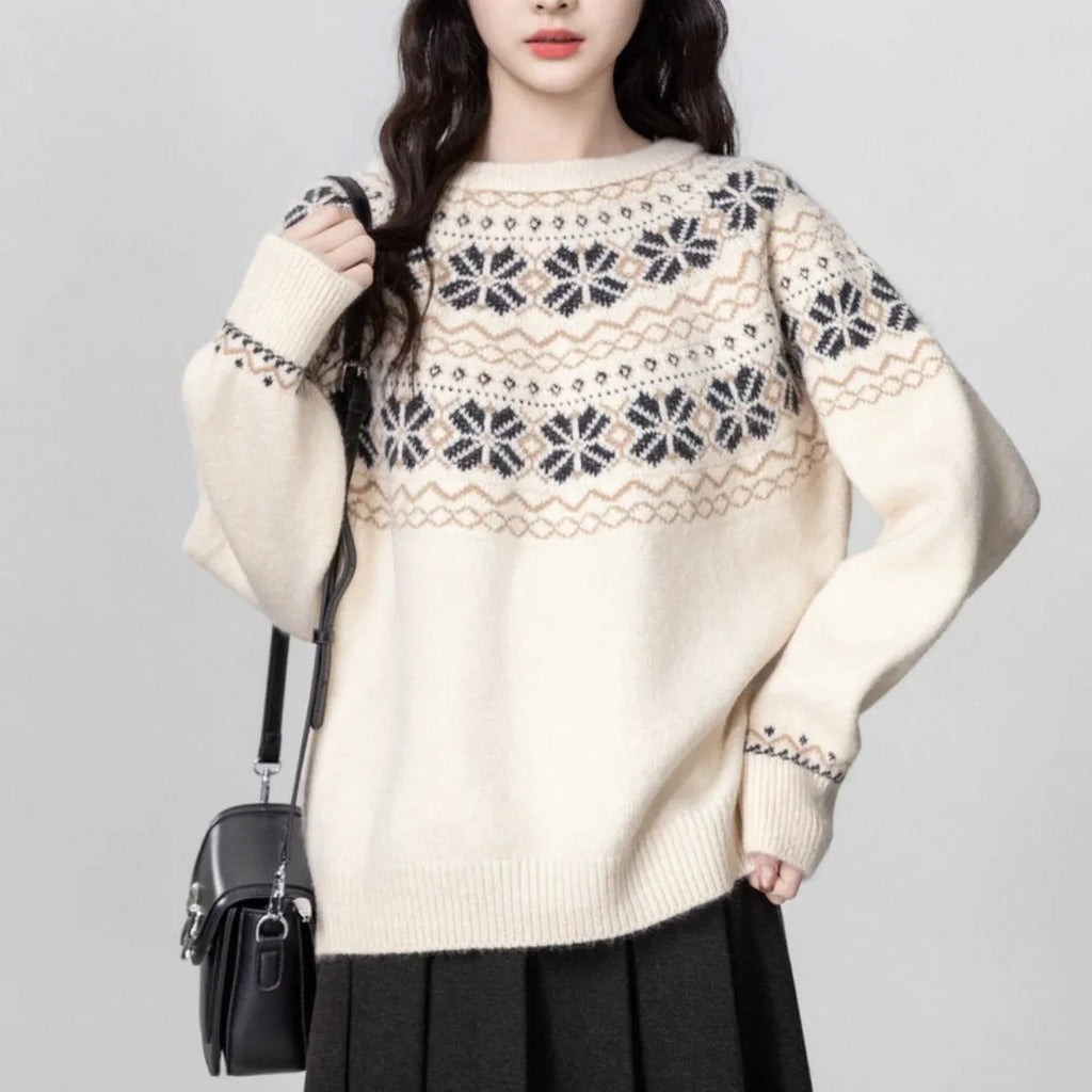 Women's Milky White vintage Fair Isle geometric knit pullover sweater on a hanger.
