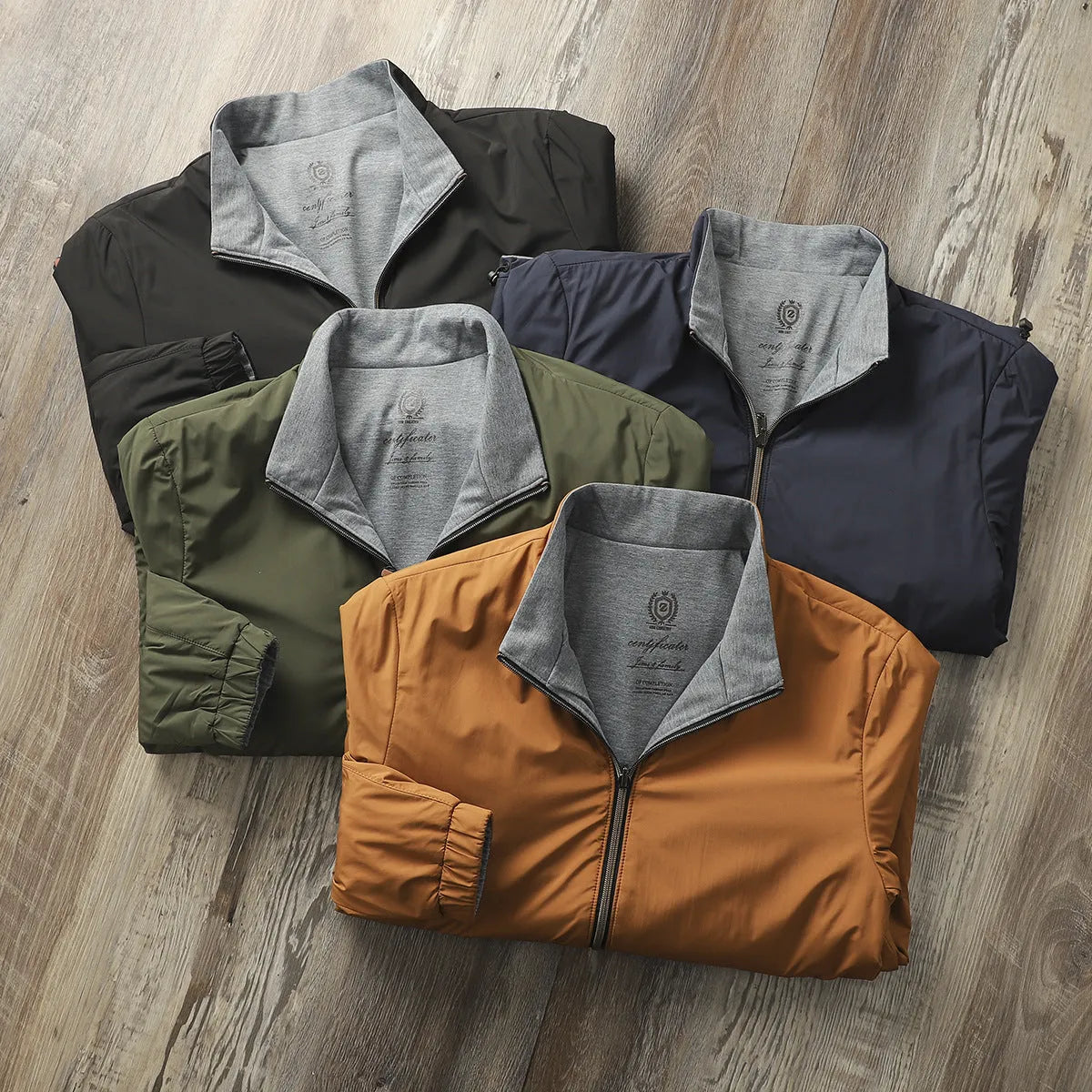Men's simple stand collar jacket in a polyester-cotton blend, shown in one of four available colours.