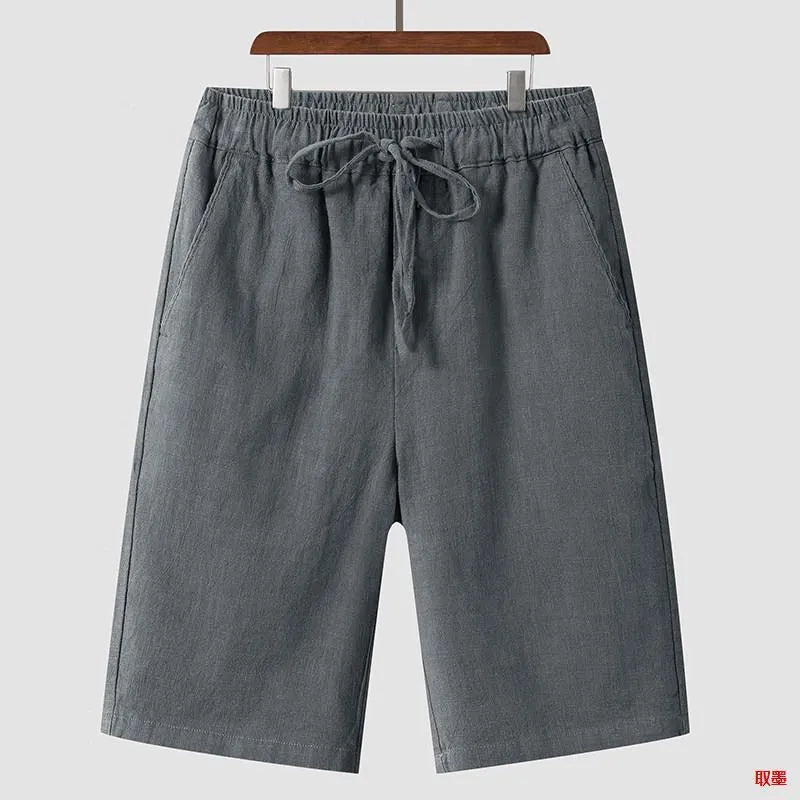 Men's linen shorts in loose cropped style with elastic waistband in various colours