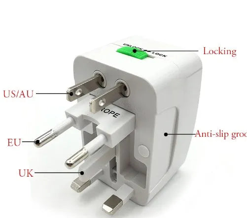 Compact white universal travel adapter plug for international power socket conversion.