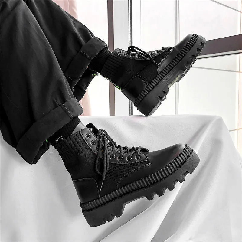 Men's black frosted leather Dr Martens platform boots with a side zip and 8-hole high top design.