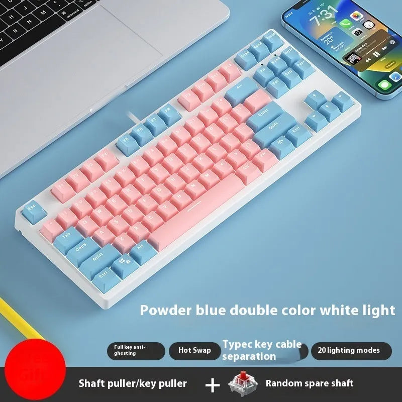 87-key wired mechanical keyboard with two-tone keycaps, shown with switch puller and cleaning brush