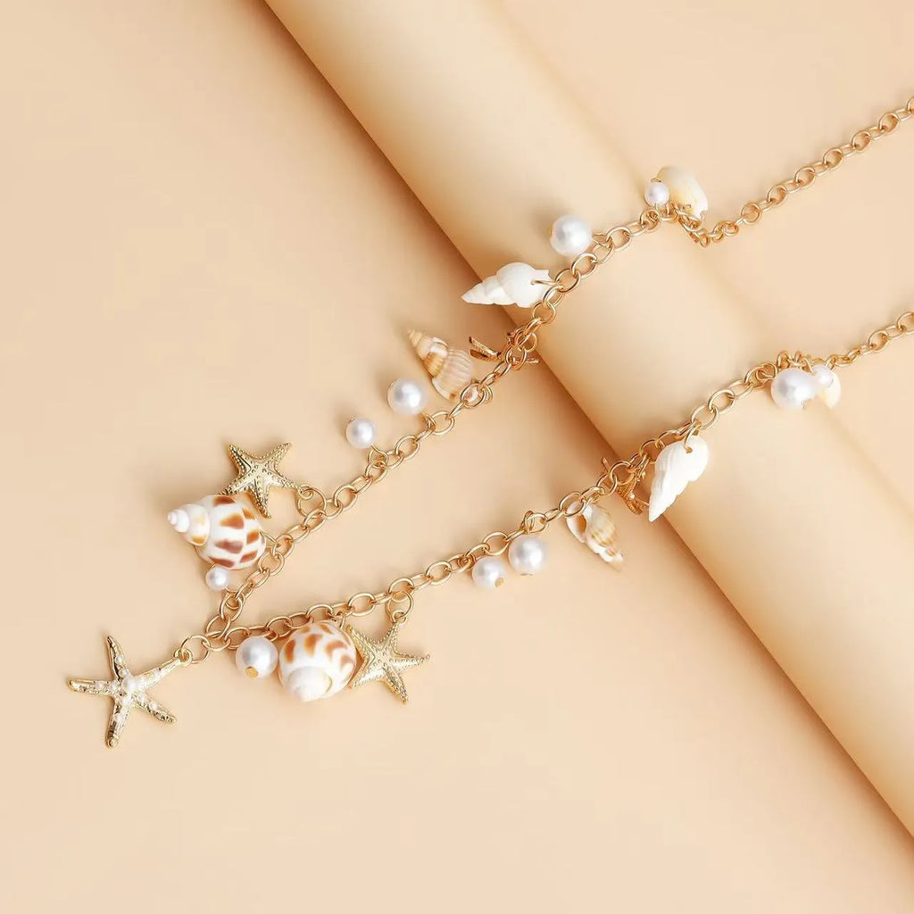 Women's beach waist chain and matching bracelet set with star-shaped alloy charms for summer jewellery styling