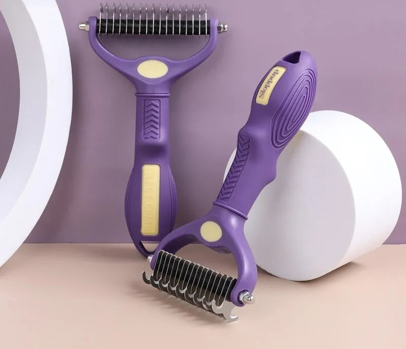 Purple double-sided plastic pet grooming comb with knot-untangling teeth on one side and smoother brushing side