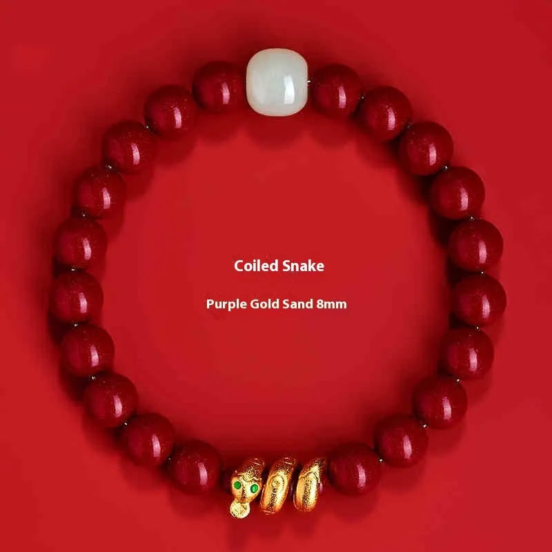 Handmade Chinese-style snake zodiac bracelet made from cinnabar beads.