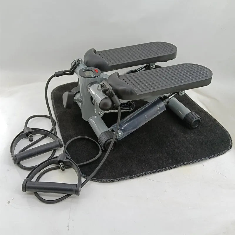 Silver grey hydraulic pedaller machine for home waist slimming and cardio exercise