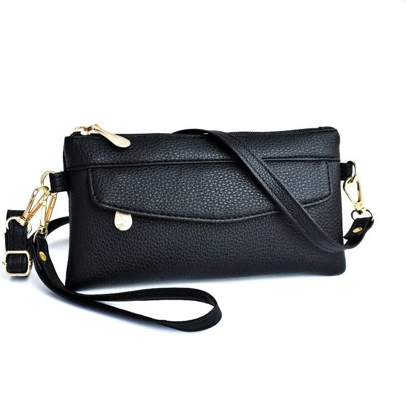 Soft PU leather crossbody bag in a square shape showing the internal sandwich zipper pocket.