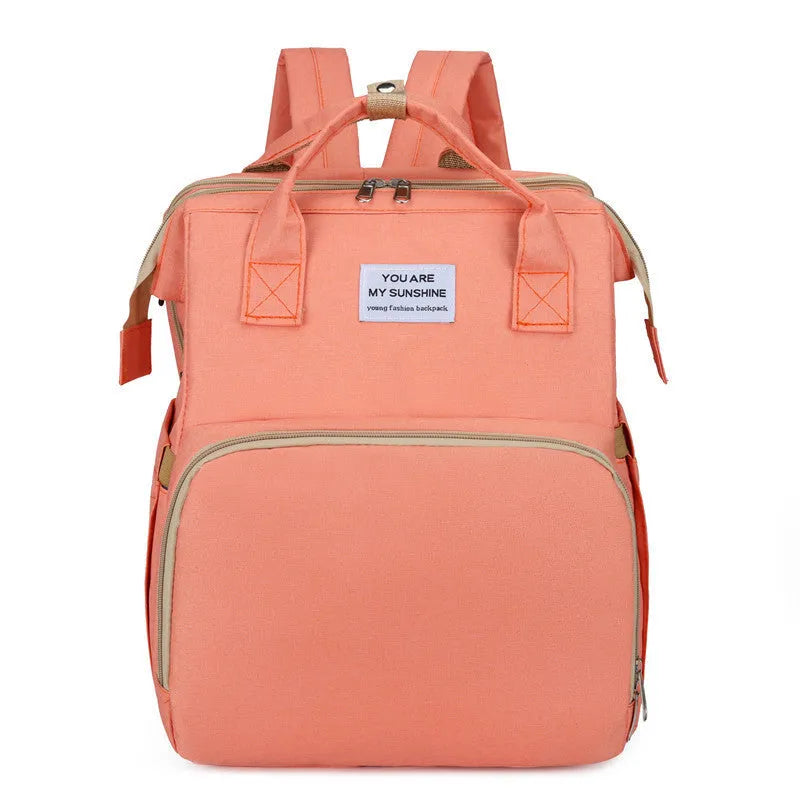 Lightweight nylon mother and baby bag with USB port, curved shoulder strap, shown in blue colour.