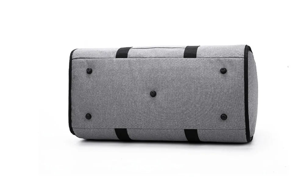 Cylinder-shaped medium travel bag in Oxford cloth, shown in black with a zipper opening.
