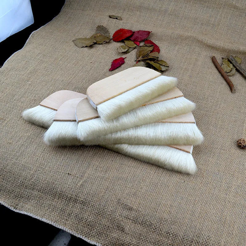 Wool brush for mounting paste application on artwork boards