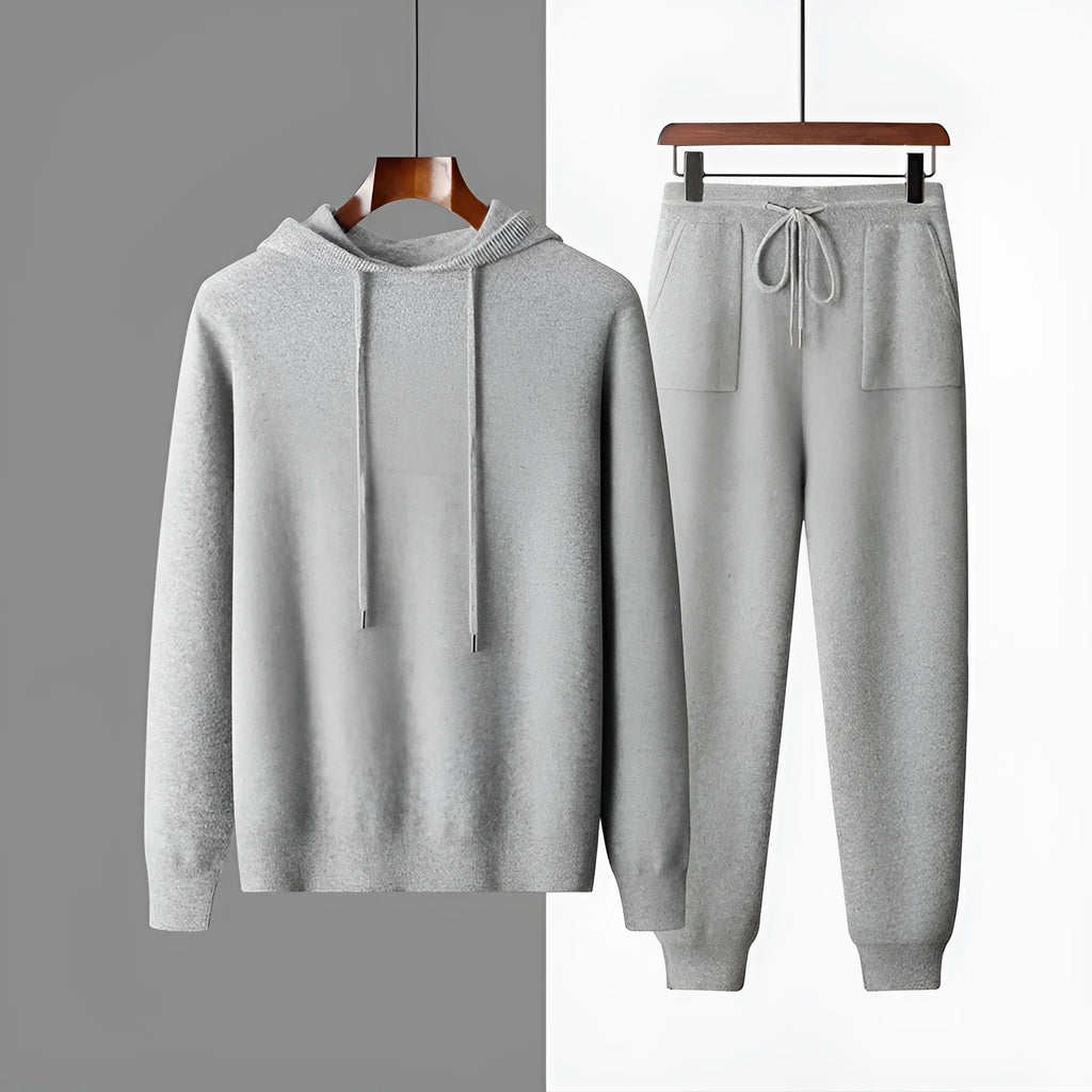 Men's light grey cashmere knitted hoodie and matching long pants casual set laid flat.