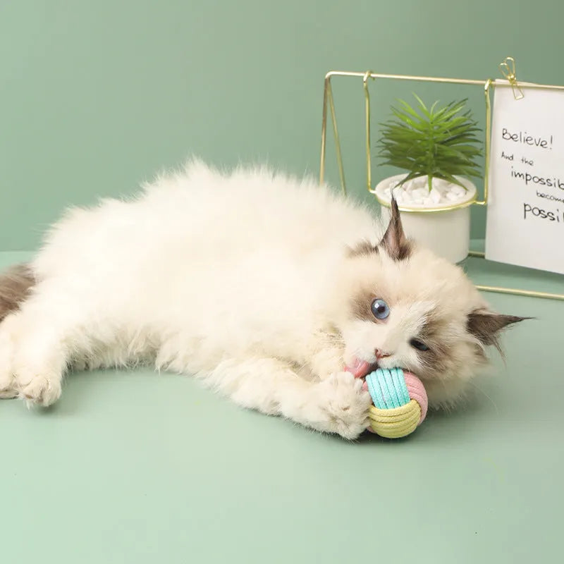 Handmade 5cm cat hair ball plush toy in cotton fabric for teeth grinding and interactive play
