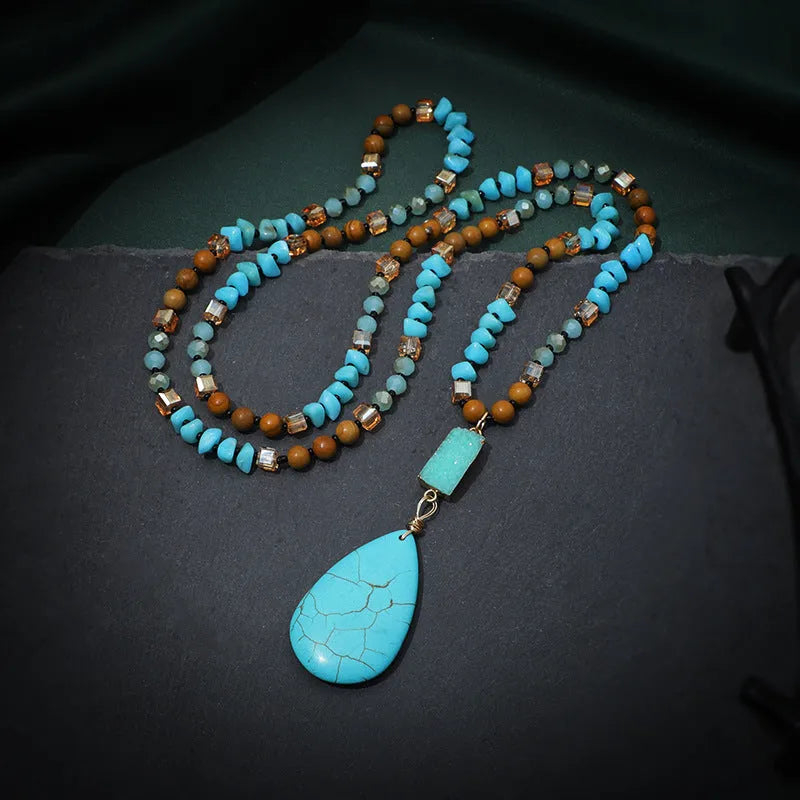 Blue turquoise imitation mineral necklace with large water drop pendant and ball bead chain.