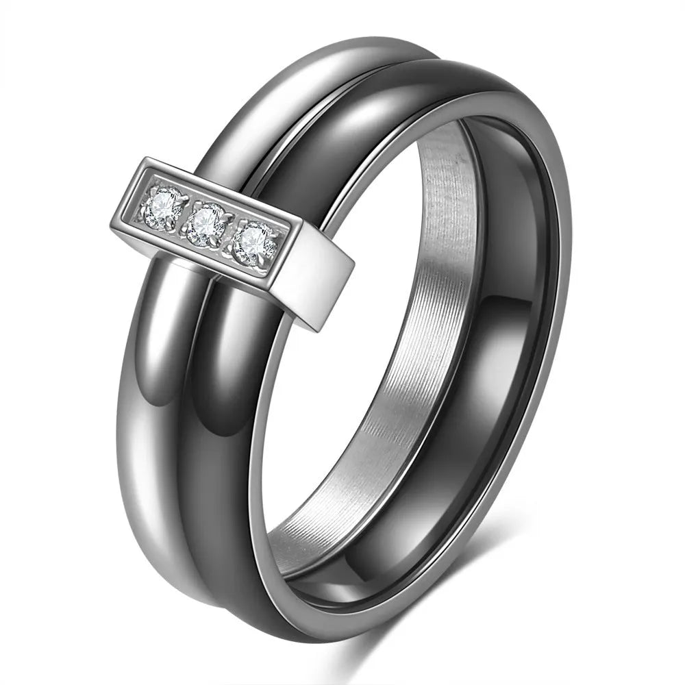 Glossy stitch and zirconium inlay ceramic ring for women in gold white on a geometric band.