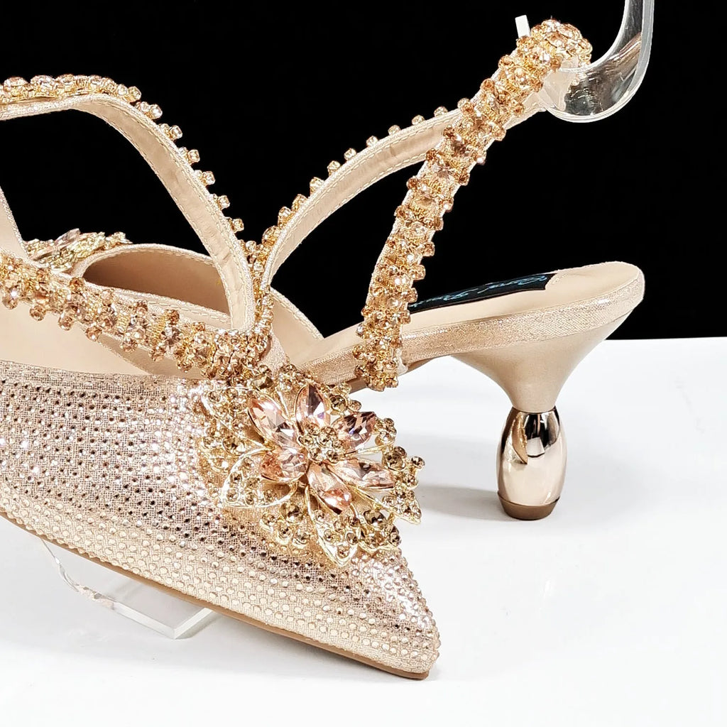 Sexy women's high heel shoes and matching hard clutch bag with floral ankle chain and rhinestone buckle