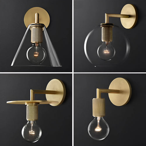 Gold bronze or black wall lamp with triangular transparent glass shade and wrought iron frame for bedside or hallway use