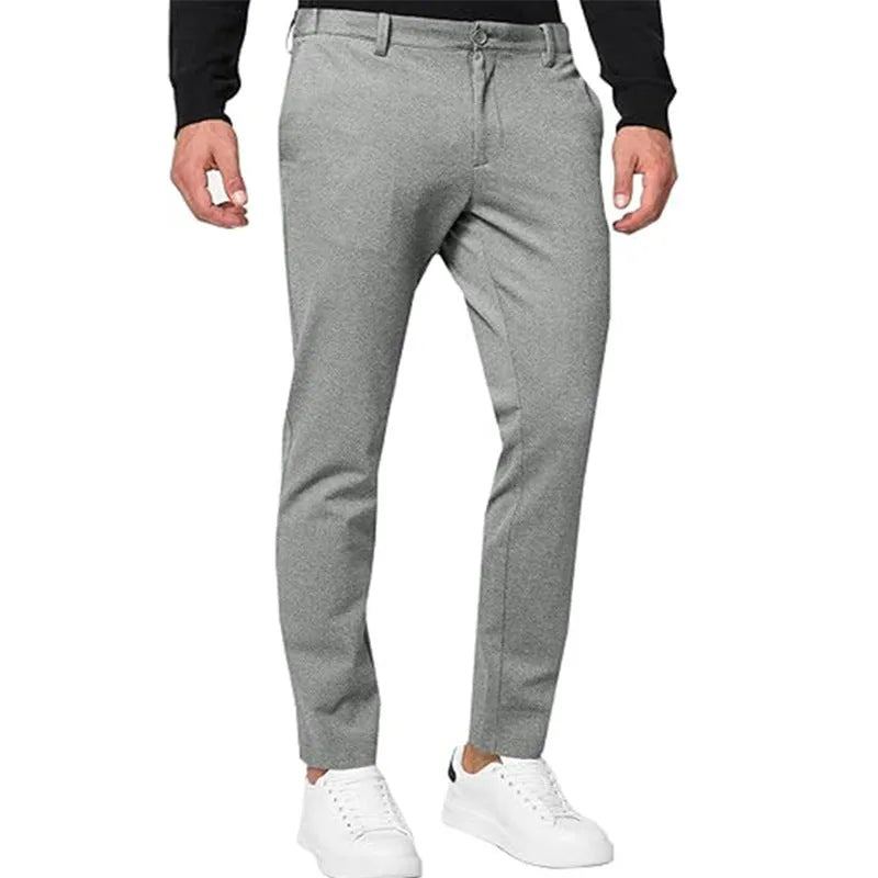 Men's slim-fit tapered chino trousers in a grey cotton blend fabric with a zipper fly.