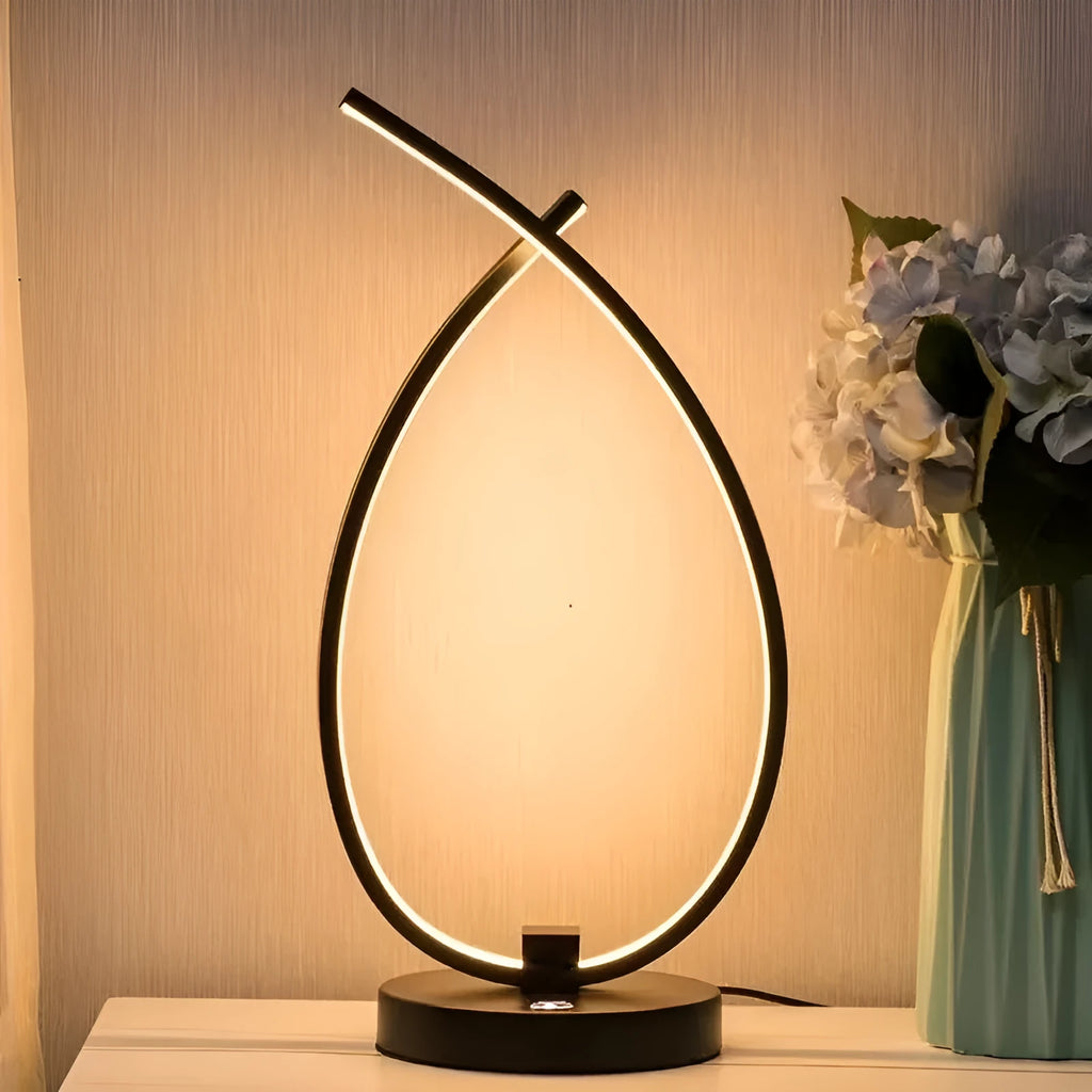 Creative water drop shaped desk lamp in black or white with warm LED lighting