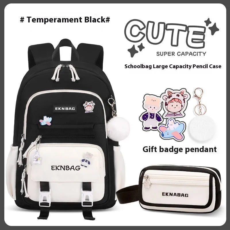 Pink waterproof Oxford cloth school backpack for girls with curved shoulder straps.