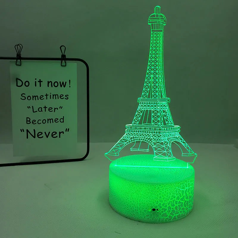 Eiffel Tower shaped table lamp with multi-colour 3D visual slide design and acrylic lampshade.