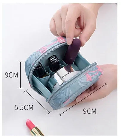 Cube-shaped cloth makeup storage bag in blue, pink, white, and white pink colour options