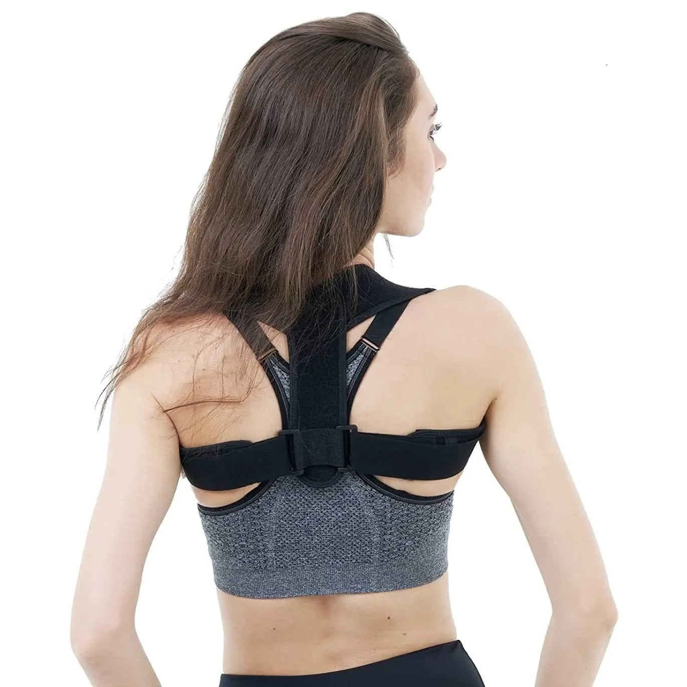 Black adjustable posture correction strap for back and shoulder support.