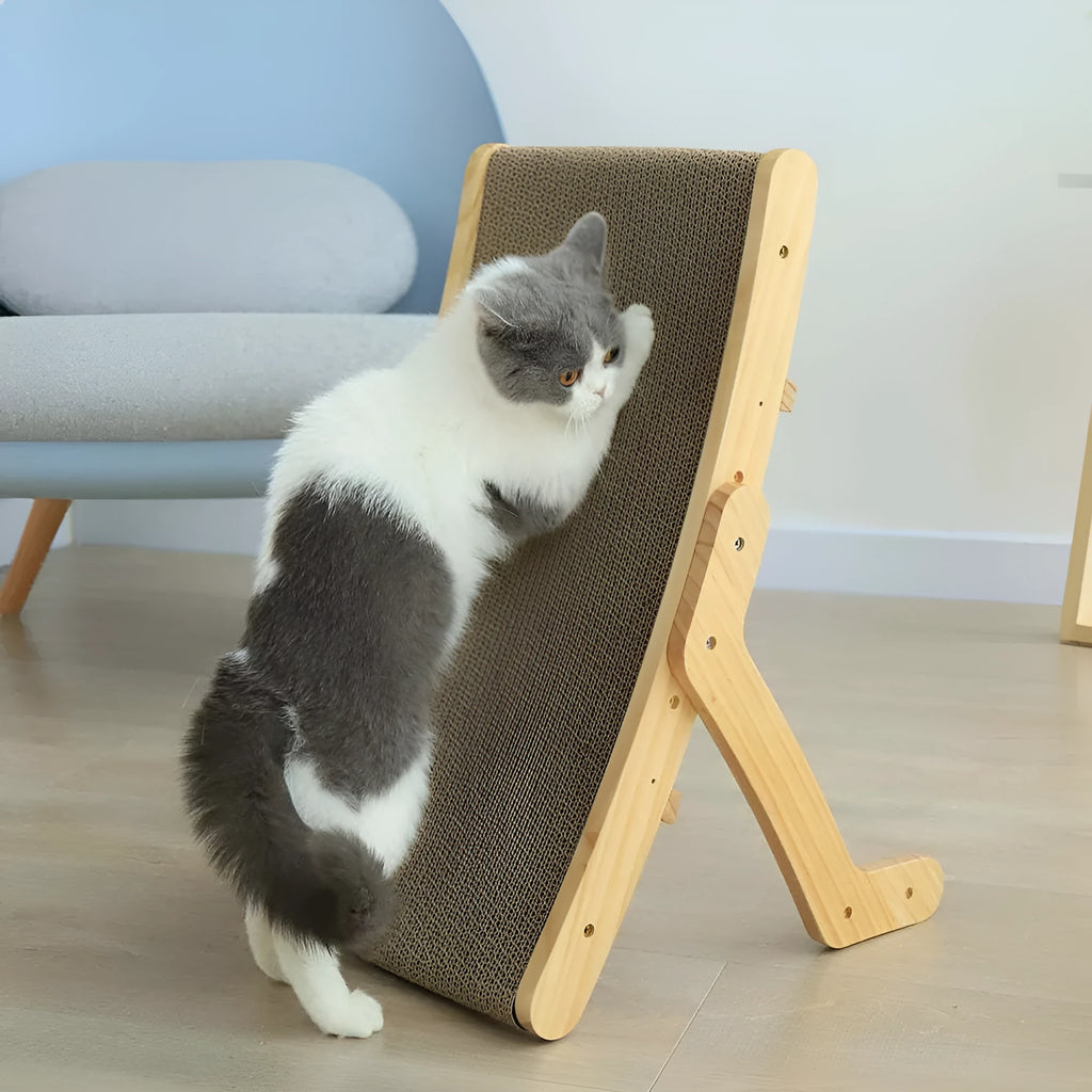 Deformation cat bed and scratcher in primary colour with corrugated paper surface, pine frame and three adjustable angles.