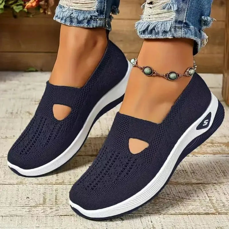 Women's casual flat mesh shoes with T-strap in assorted colours on soft PVC sole
