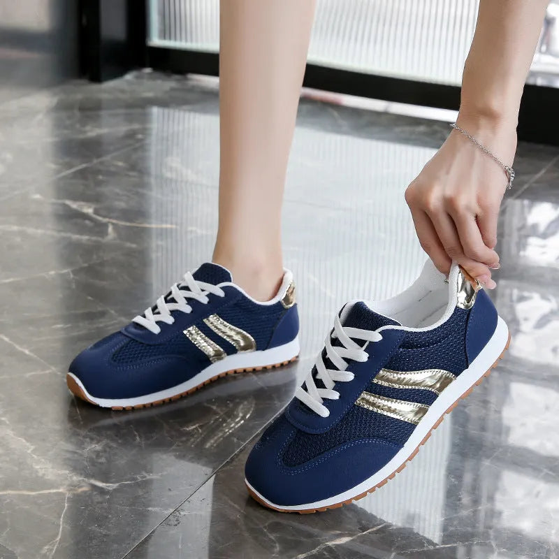 Blue women's casual tennis shoes with cross shoulder straps and non-slip rubber soles