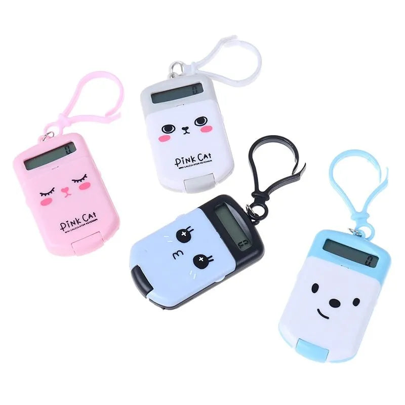 Cookie-shaped mini plastic calculator with key ring, 6.4cm x 3.6cm x 11.2cm, in pink, blue, grey, or black